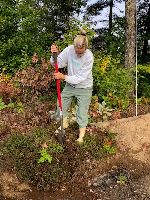 Volunteer Terry tending the Victory Garden